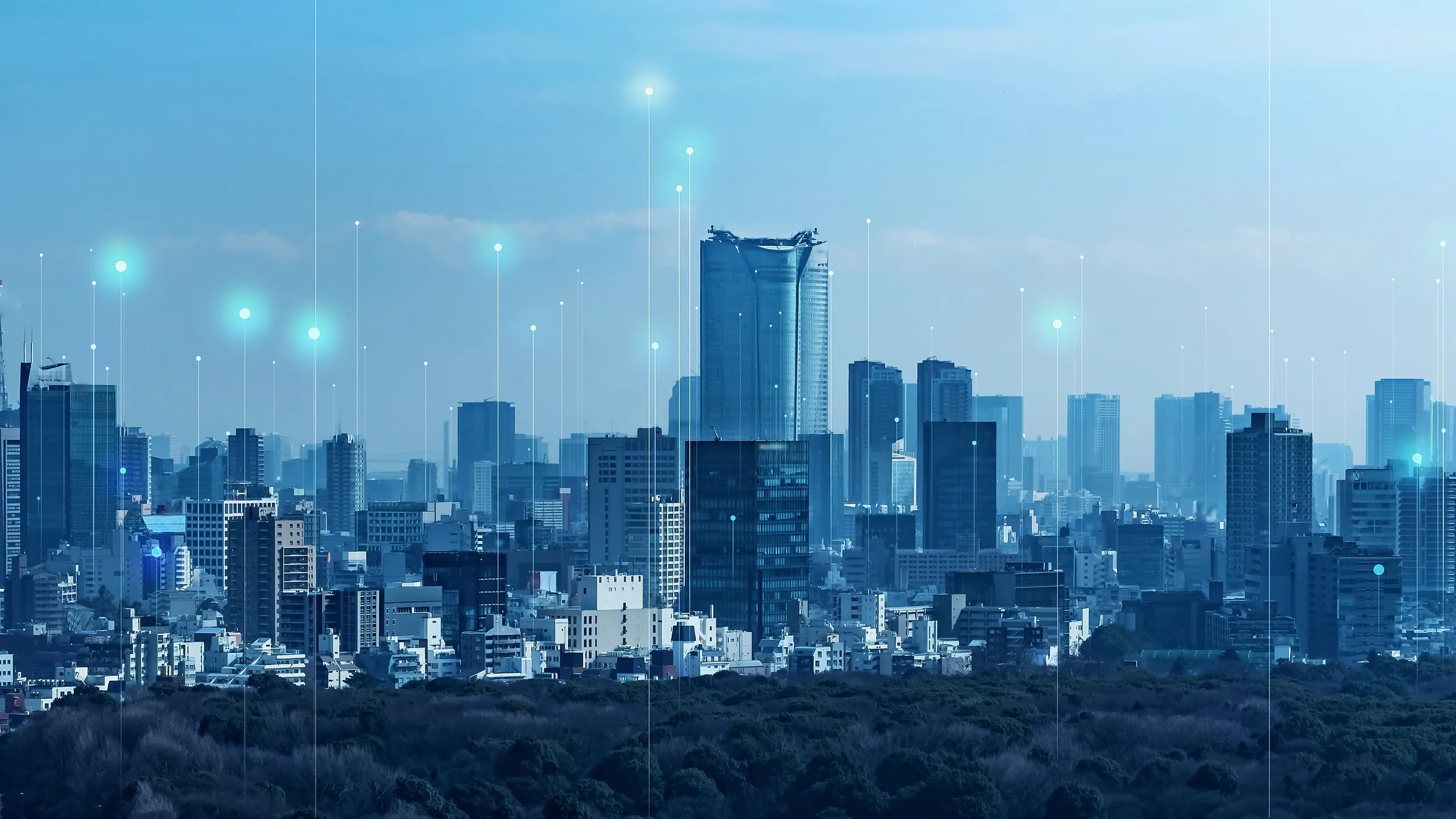 City skyline with digital connectivity highlights